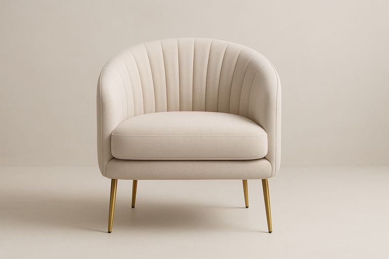 Fauteuil en tissu avec pieds en métal doré